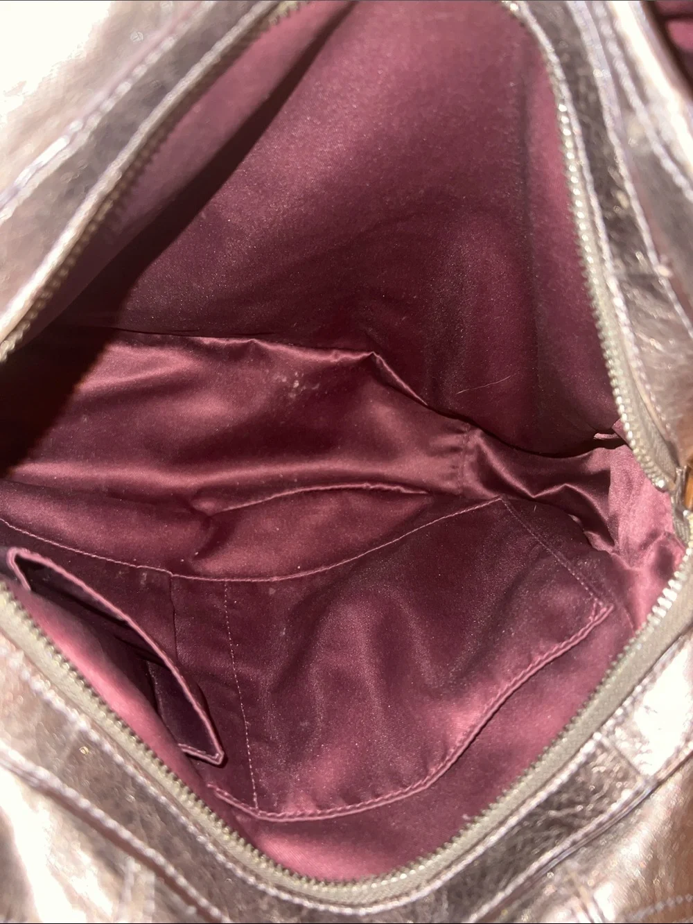 Coach Madison Maggie hobo shoulder bag featuring a metallic gunmetal leather